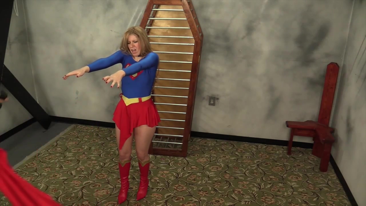 Superheroine Supergirl Captured Caged And Humiliated
